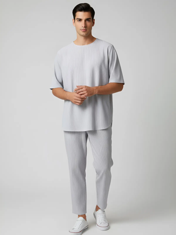Oversized top with a clean, minimal silhouette and relaxed fit.
