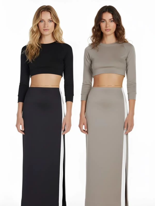 A modern two-piece set featuring a fitted long-sleeve crop top and a high-waisted maxi skirt with clean side panels.