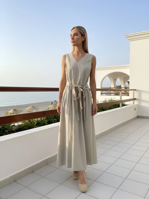 A lightweight, sleeveless summer dress designed for effortless elegance in warm-weather environments.
