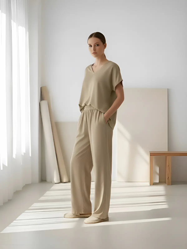 Women's relaxed-fit V-neck top in a lightweight, breathable fabric.