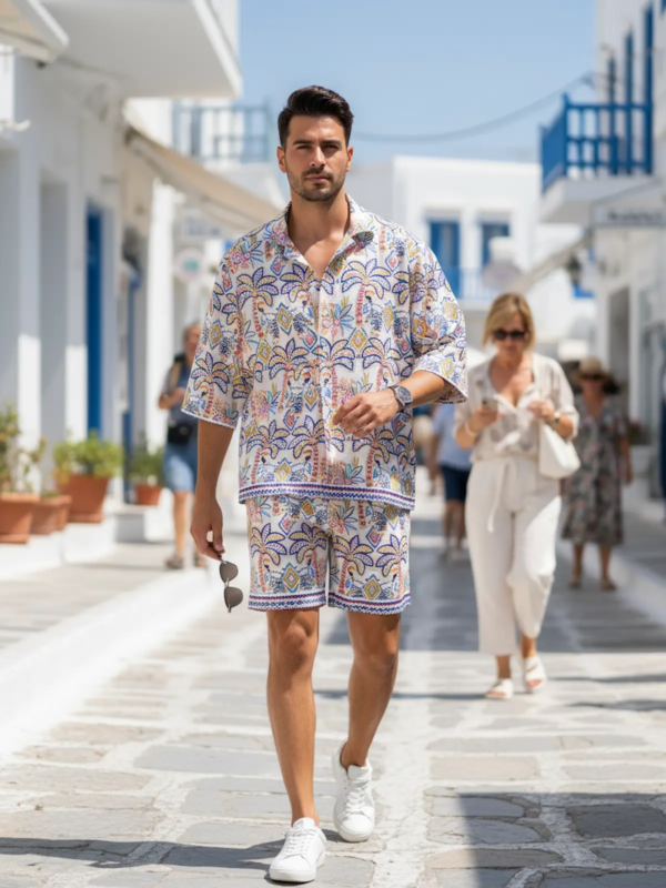 Bold summer resort set with a relaxed printed shirt and matching shorts. Lightweight, breathable and vibrant—perfect for island strolls, beach destinations and statement summer style.
